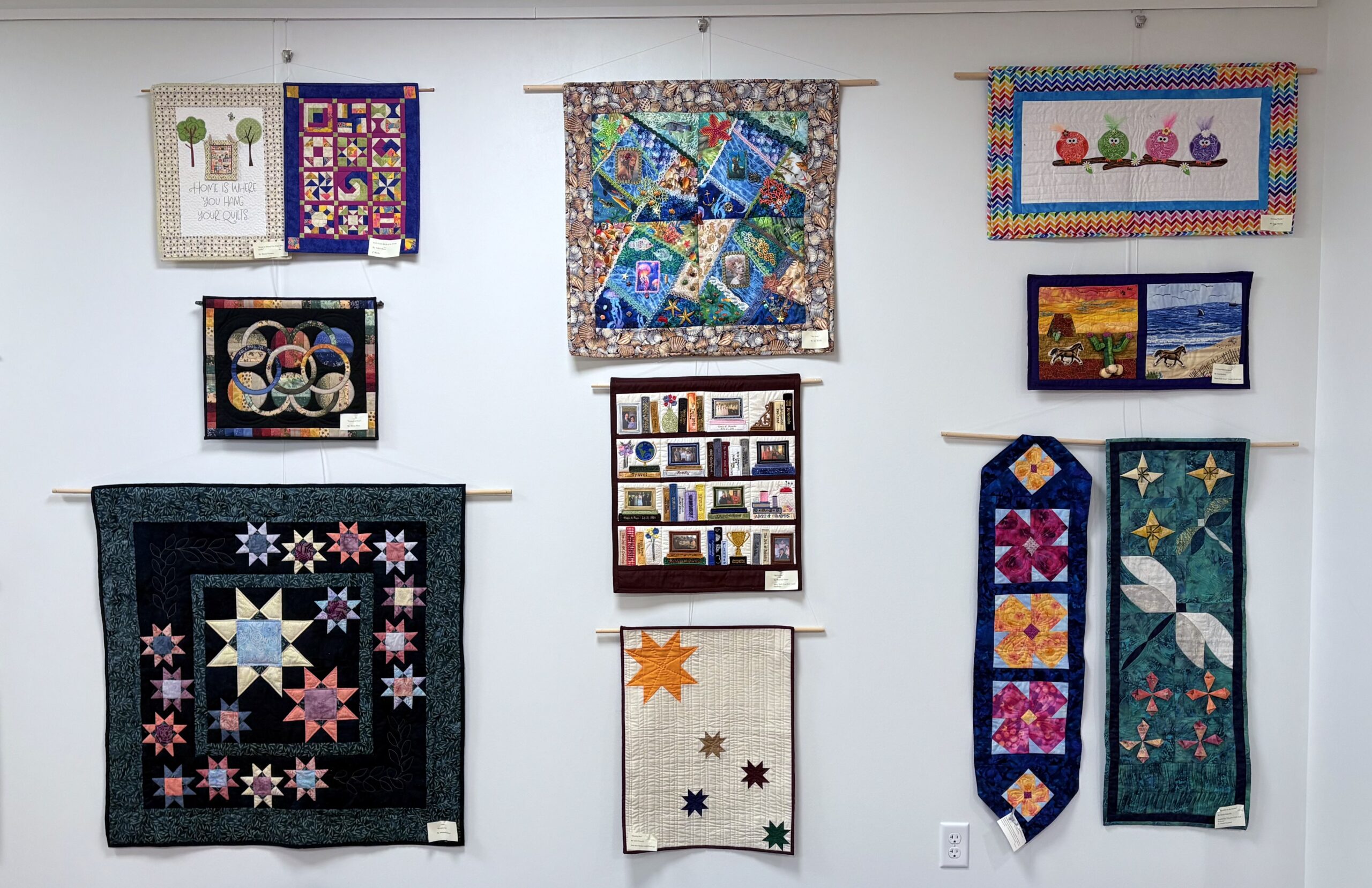 Quilts by the Cheshire Quilters Guild hung in Sept. 2025.